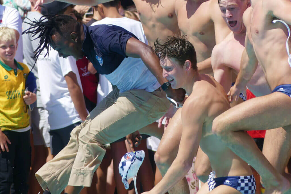 Bishops' coach Jabulani Sibiya takes a swim with the Western Province u19A team after leading them to the Inter-Provincial title in Gqeberha in December 2023. Photo: Brad Morgan.