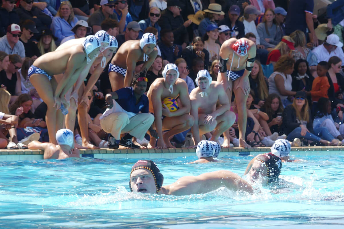 Bishops, Western Province and SA Schools' coach Jabulani Sibiya advises his Western Province team, which produced six SA Schools players, during the final of the 2023 IPT, while Central Gauteng's Greg Pryce, the Defender of the Tournament, swims past in the foreground. Photo: Brad Morgan.