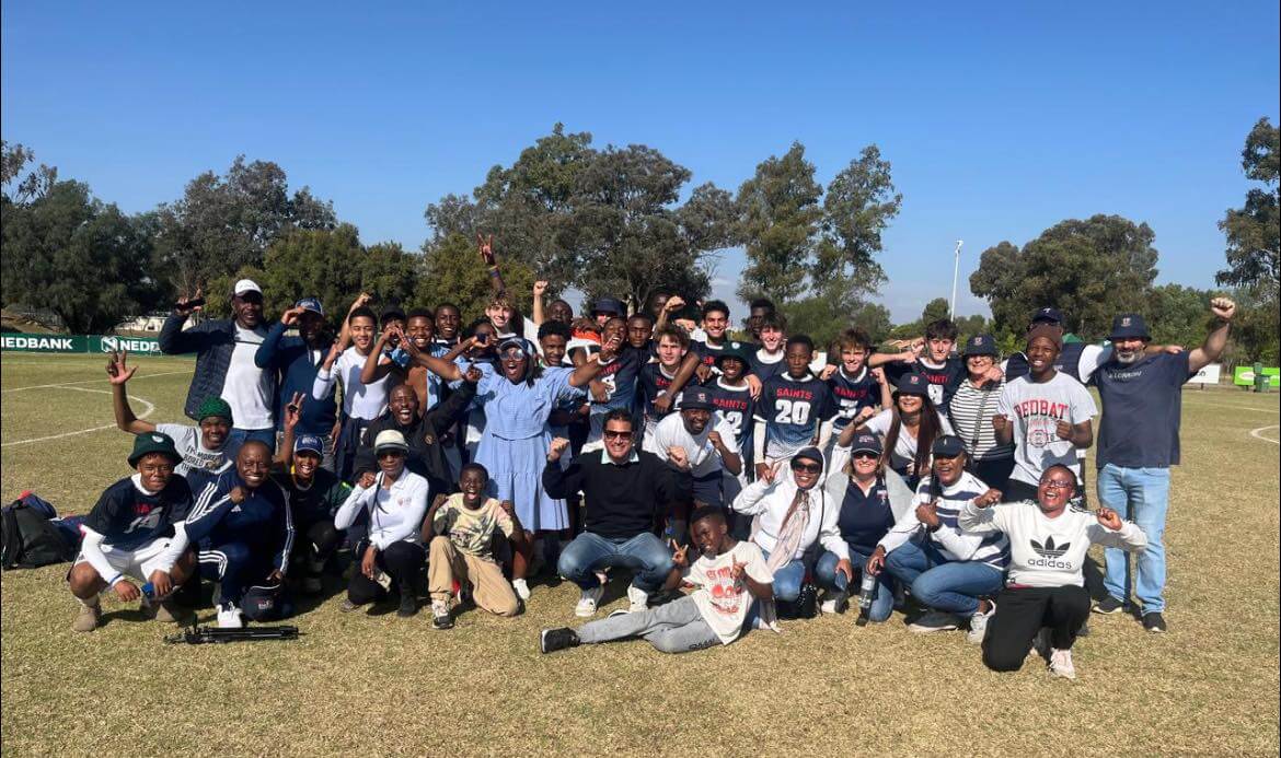 St Stithians College players and the school's supporters celebrate a successful defence of the Nedbank Grey College Soccer Tournament title.