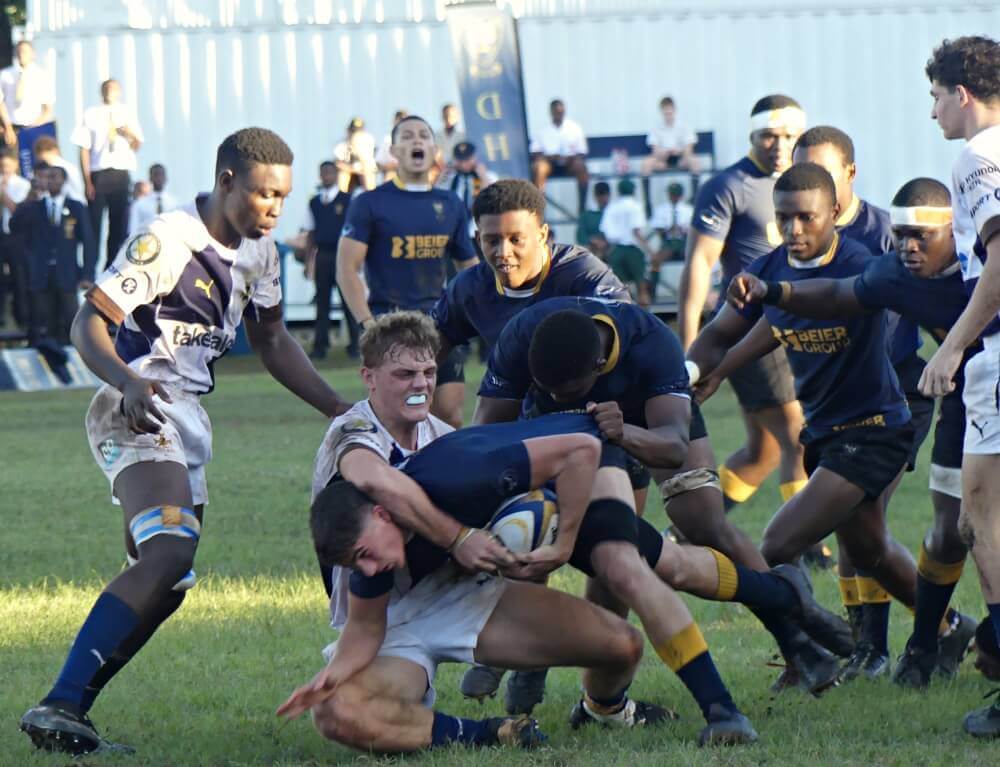 Sharks' no. 8, Jamie Wimble, shown making a tackle for orthwood against DHS, is a hard-hitting tackler and a dynamic presence on attack. Photo: Brad Morgan.