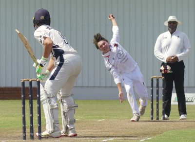 Looking like a left-arm version of Proteas' fast bowler, Gerald Coetzee, before he took to wearing a headband, Eli van Jaarsveld sends down a delivery to Westville opening batsman, Ewan du Toit. Photo: Brad Morgan. 
